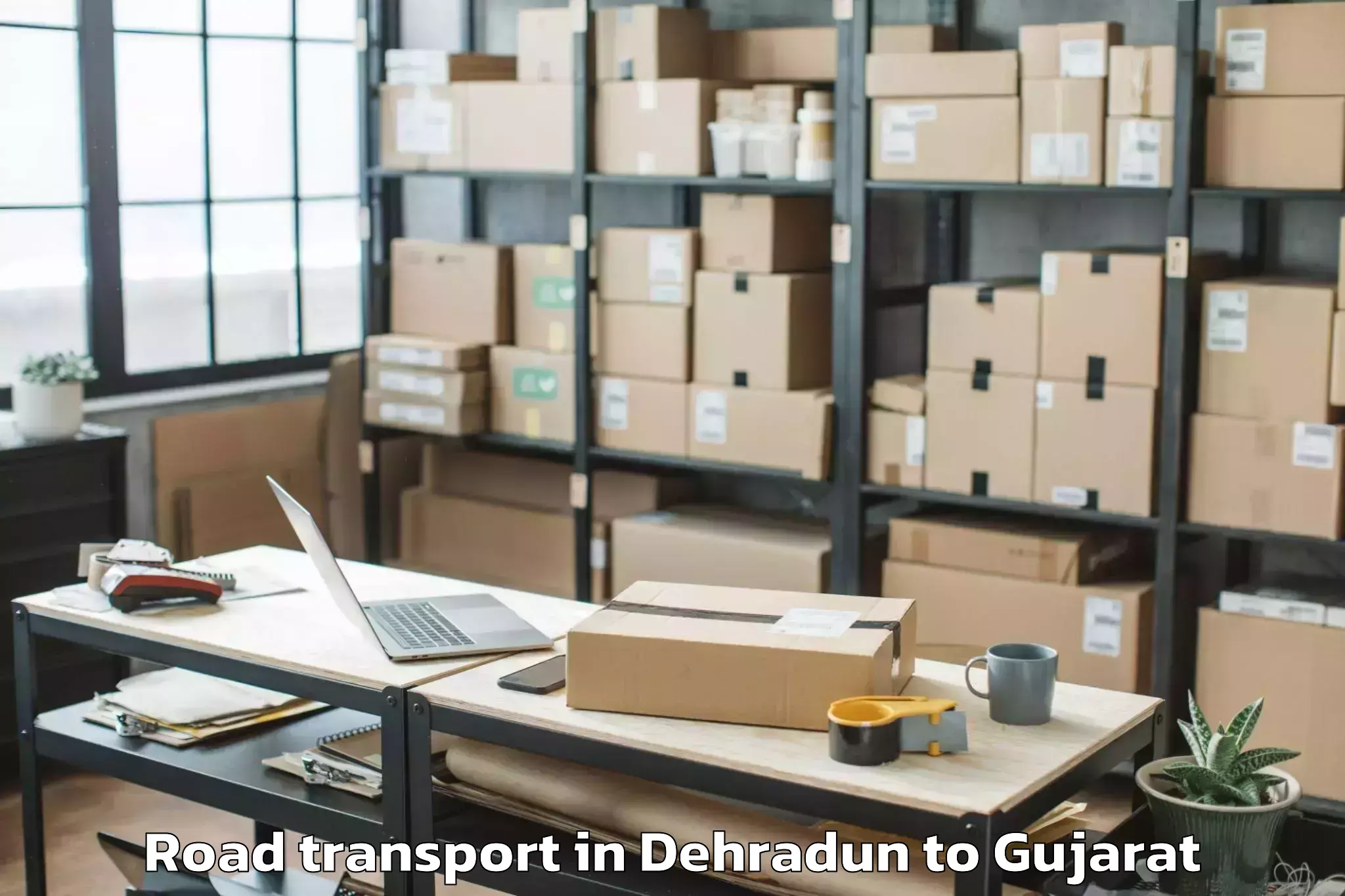 Top Dehradun to Vadgam Road Transport Available